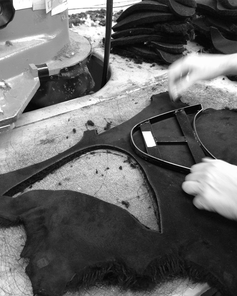 Cutting out sheepskin for our boots
