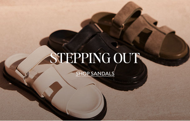 STEPPING OUT. SHOP SANDALS. 