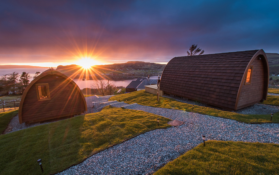 Luxury glamping pods at sunrise