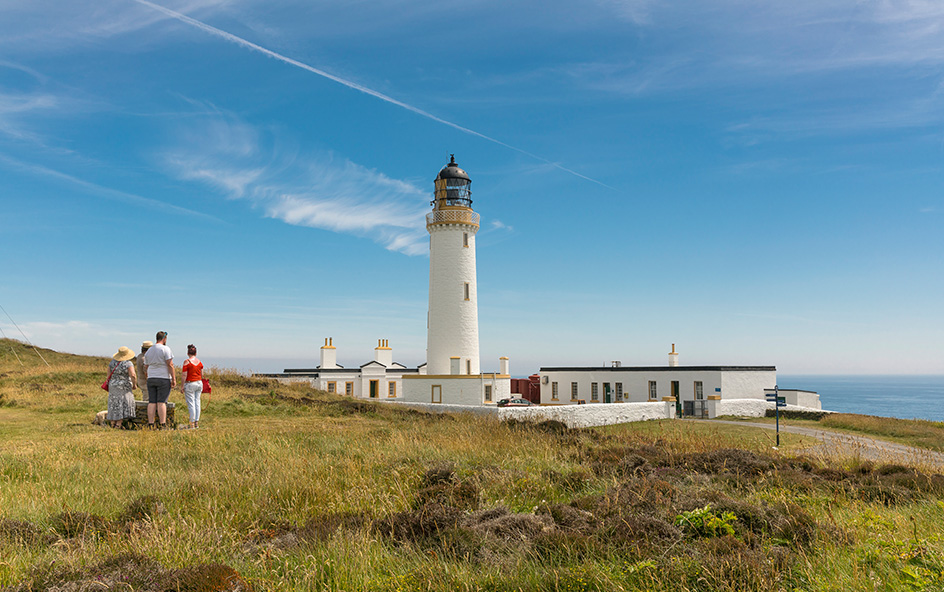 Family exploring lighthouse