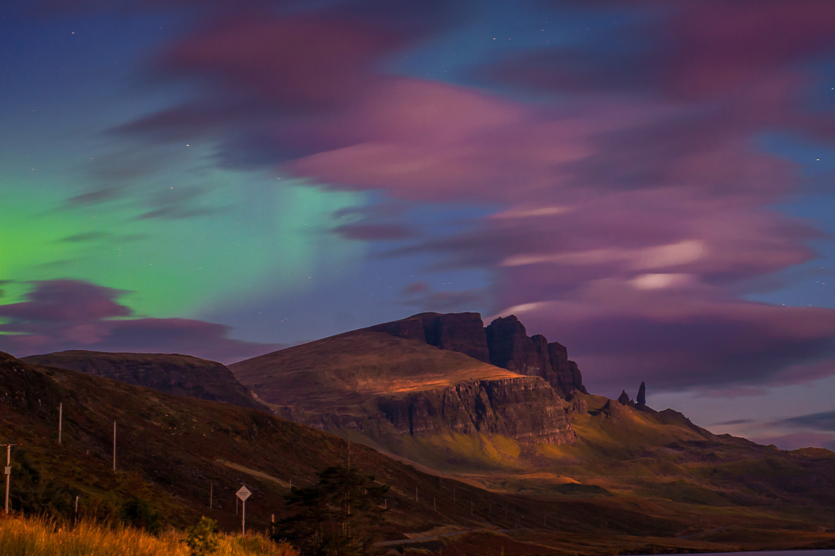 green and purple hues in the sky above the Old Man of Storr