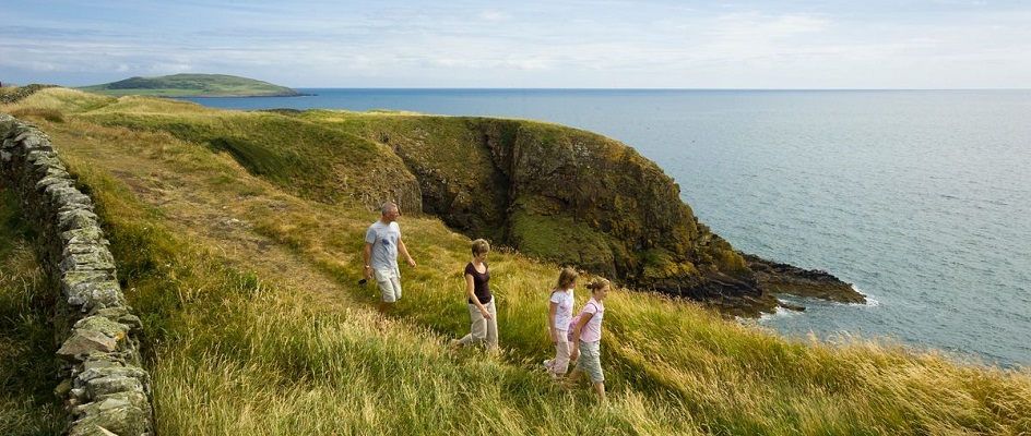 Cliff walkers at Borgue in Dumfries & Galloway