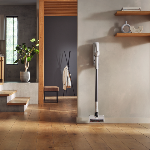 Duoflex vacuum cleaning leaning against wall in modern home