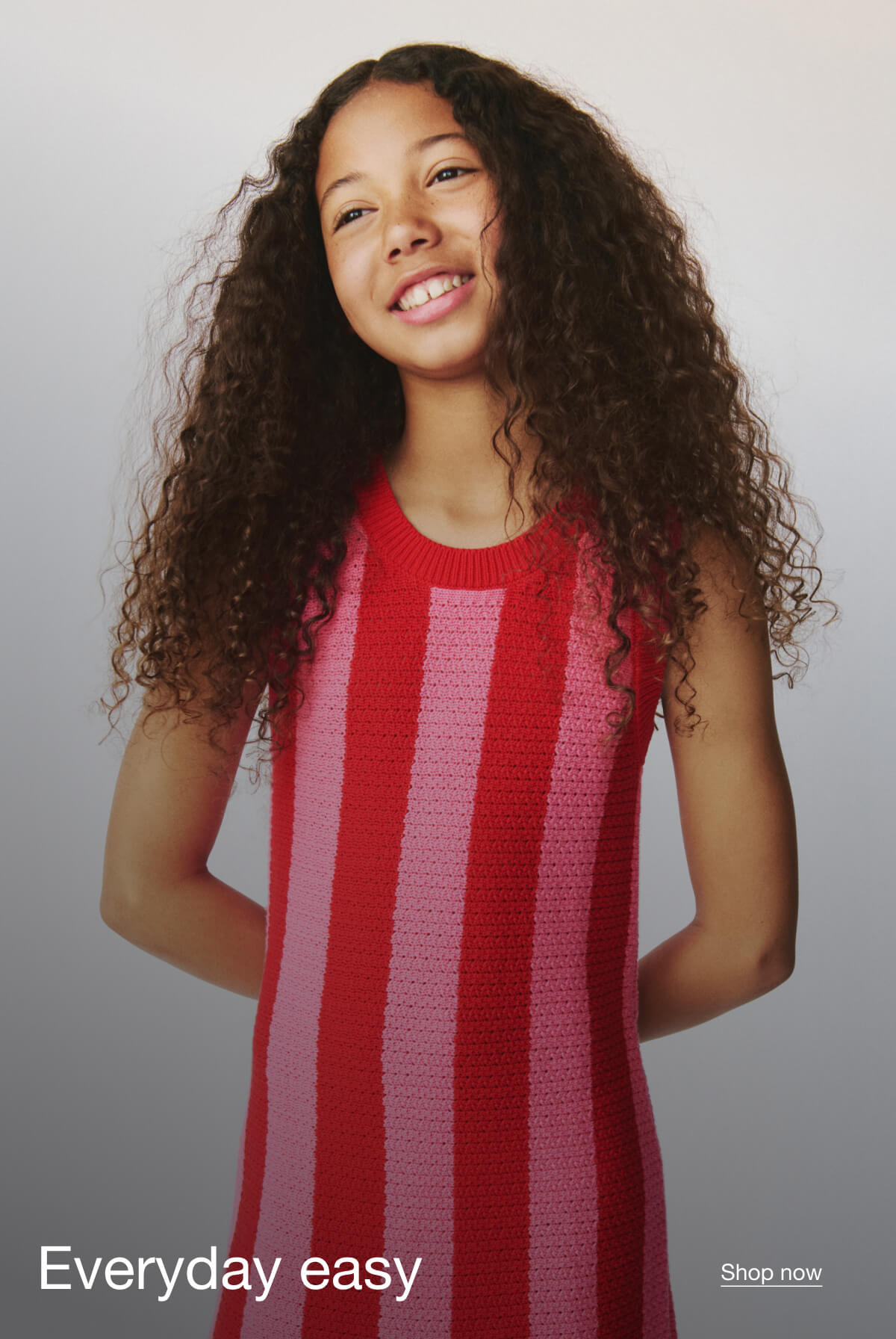 Gap Kids: Girl wearing pink and red striped dress