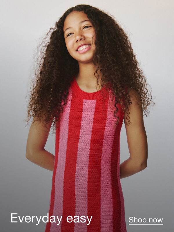 Gap Kids: Girl wearing pink and red striped dress