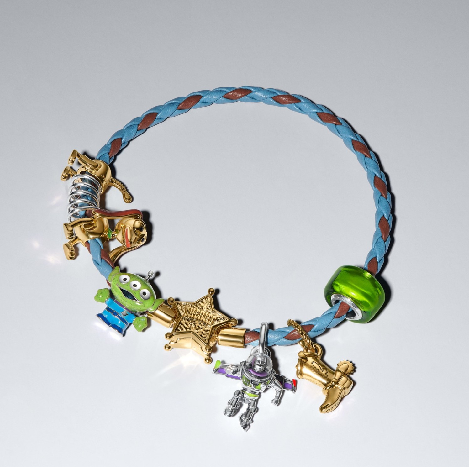 Model wearing necklace with charms