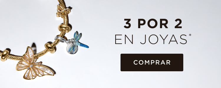 Close up on a smiling woman's face as she shouts, styled in stacked gold-plated MOM rings. 