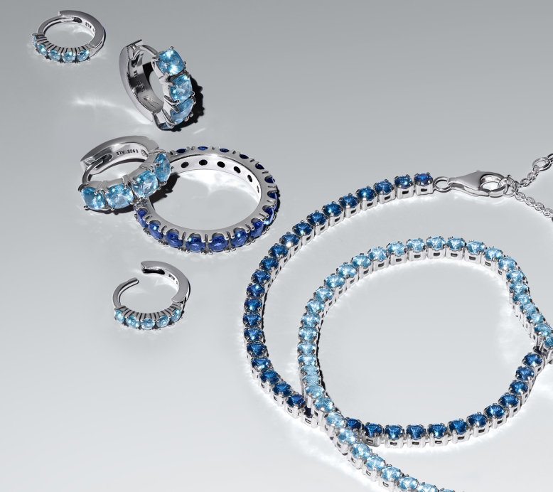 Blue necklaces, rings, and bracelets