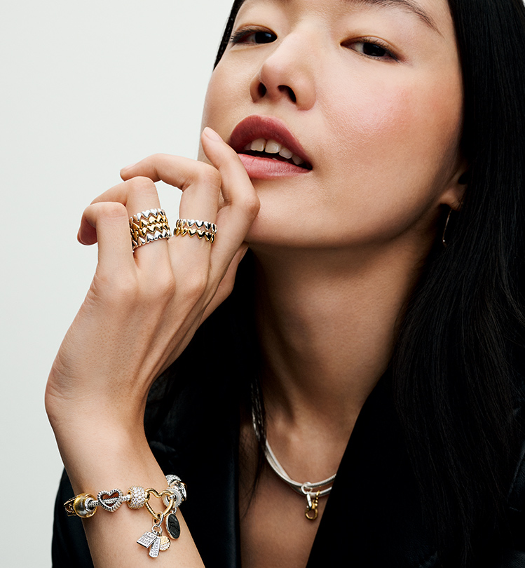 Model wearing Pandora jewelry