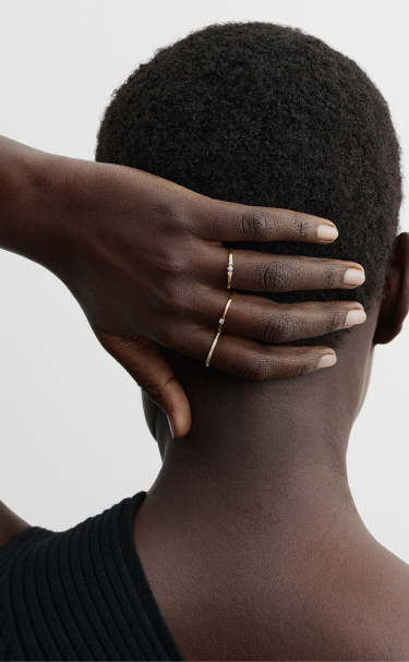 Model wears lab-grown diamond rings