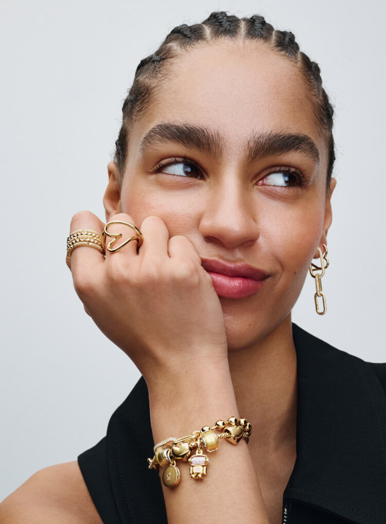 Model wearing 14k gold-plated jewelry