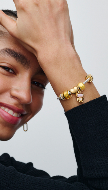 Model wearing 14k gold-plated jewelry