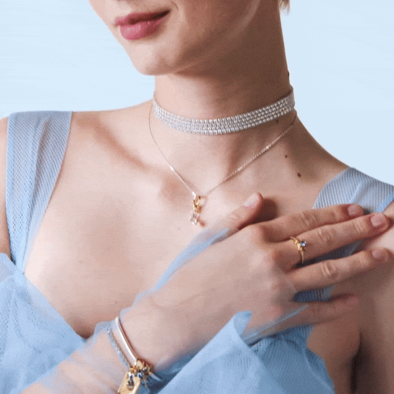 Model wearing Disney x Pandora jewellery inspired by Disney's Cinderella