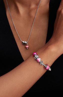 Pandora bracelet and necklace worn on model