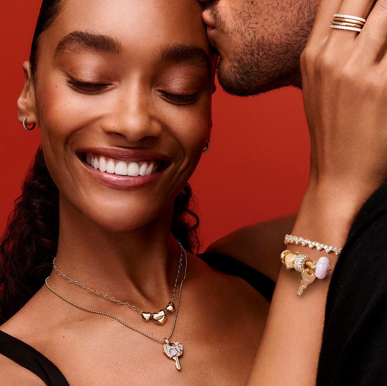 Model wearing Pandora key charms 