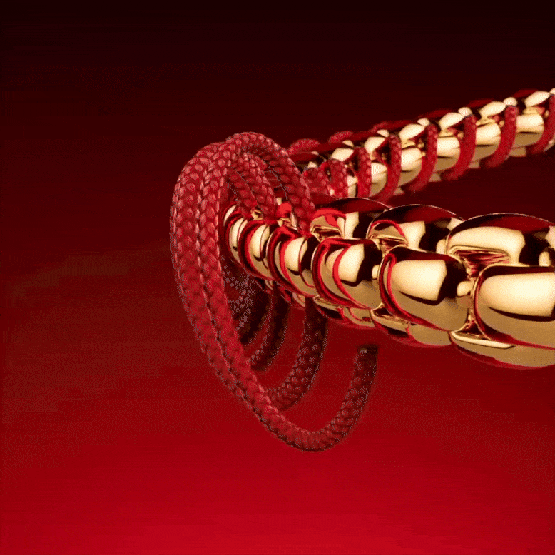 Year of the Horse charms styled on our new 14k gold-plated snake chain bracelet