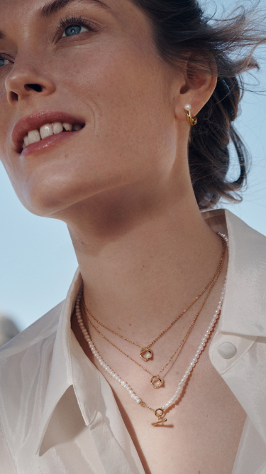 Model wears new PANDORA ESSENCE jewellery