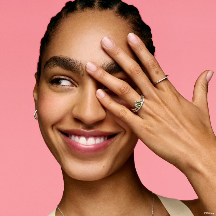 Model wears rings inspired by Disney Princesses